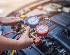 SERVICIO PARA CARGA DE REFRIGERANTE DE SISTEMA DE AIRE A AUTO TIPO PANEL